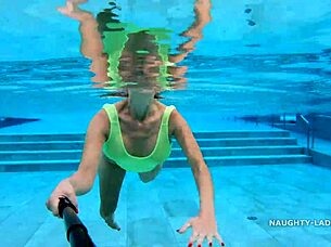 Milf Wife Wears Transparent Wet One-Piece Bikini In Public Pool, Flashing Exhibitionist Style.