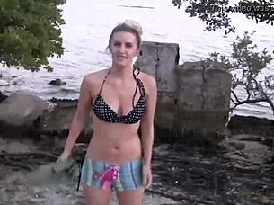 this teen blonde does a flashing striptease in bikini by the beach in public