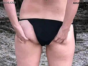 this teen blonde does a flashing striptease in bikini by the beach in public