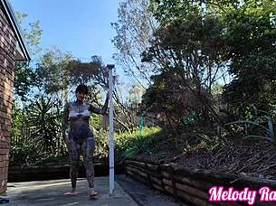 Beautiful mature woman tries on cheeky micro bikinis.