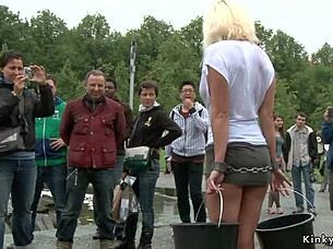 Why is that busty blonde in a wet shirt in public?