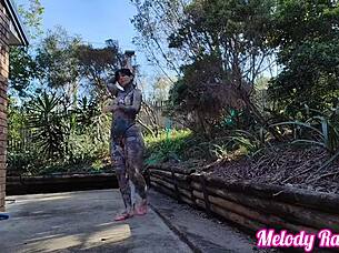 Beautiful mature woman tries on cheeky micro bikinis.