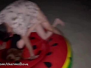 Beautiful Thai girl enjoys the beach at Full Moon Party with friends and locals.