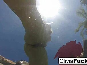 Olivia has some summer fun in the pool with blonde milf babe