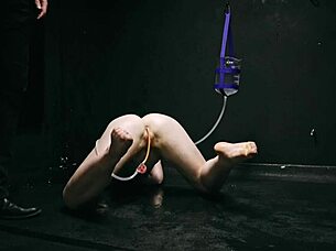 Bound naked in bondage getting enema close up on asshole!