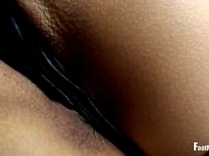 Jade Vixen slowly removes her black nylon hose and stockings