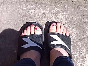 feet basking in the sun before getting a pedicure, ready for fetish play