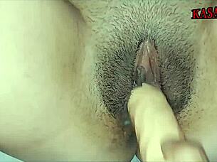 Married woman endures double penetration from two massive cocks, wrecking her well-endowed body.