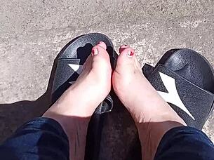 feet basking in the sun before getting a pedicure, ready for fetish play