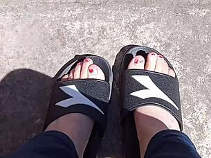 feet basking in the sun before getting a pedicure, ready for fetish play