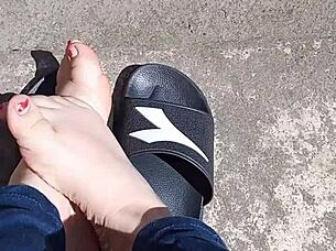 feet basking in the sun before getting a pedicure, ready for fetish play