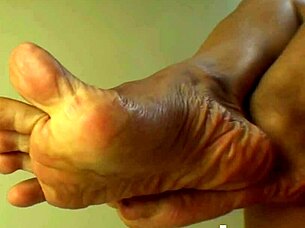 Jade Vixen slowly removes her black nylon hose and stockings