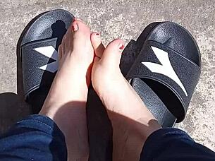 feet basking in the sun before getting a pedicure, ready for fetish play
