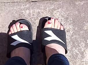 feet basking in the sun before getting a pedicure, ready for fetish play