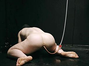 Bound naked in bondage getting enema close up on asshole!