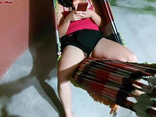 Distracted Stepmom Exposes Big Pussy on Hammock