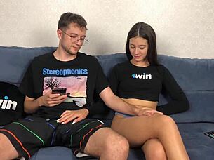 Step brother catches sister giving handjob on couch