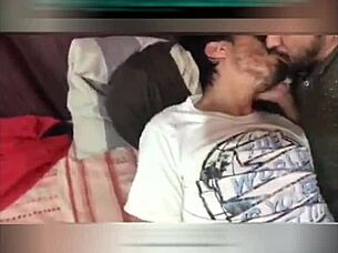 A tender white kiss shared between two men in the snow unfolds quietly.