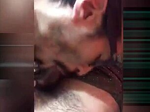 A tender white kiss shared between two men in the snow unfolds quietly.