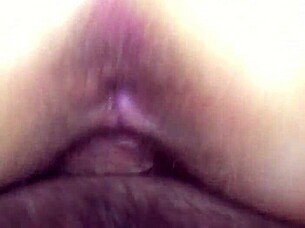 My hairy wife spreads her legs wide, gaping her pussy and queefing loudly during our wild session.