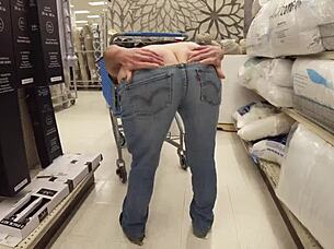 Housewife flashes huge asshole in public shop, staged by pornstar.