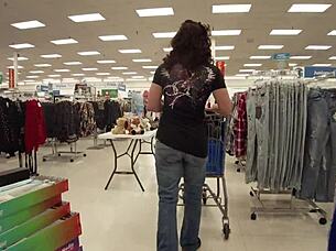 Housewife flashes huge asshole in public shop, staged by pornstar.