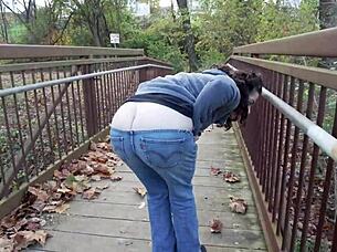 Housewife flashes huge asshole in public shop, staged by pornstar.