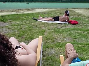 Beach voyeur self-touching session with beautiful amateurs