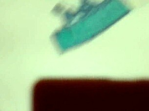 Anime scene featuring a group of four characters in an intimate setting.