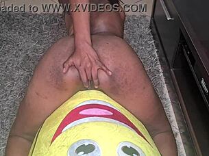 Look at this tattooed desi slut humping a big banana up close