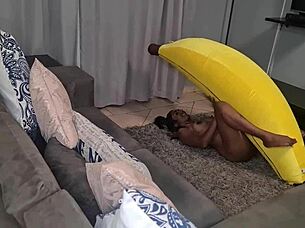 Look at this tattooed desi slut humping a big banana up close