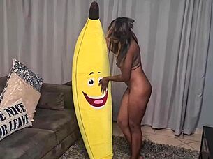 Look at this tattooed desi slut humping a big banana up close