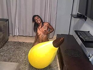 Look at this tattooed desi slut humping a big banana up close