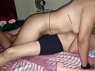 Lesbians pleasuring each other for Christmas with kissing, sex, and toys.