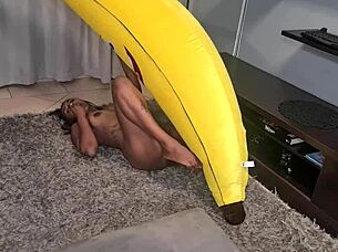 Look at this tattooed desi slut humping a big banana up close