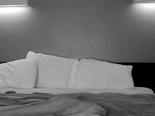 Transsexual in Fishnets Uses Toys on Bed in Crossdressing Pleasure