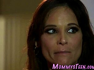 Horny milf enjoys lesbian oral with teen.