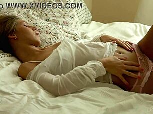 Beautiful tanned teen Anjelica fingers her pussy