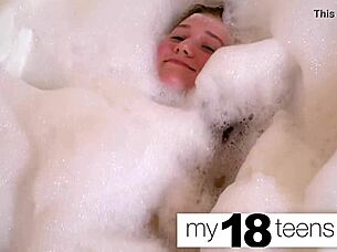 hey, check out this babe pleasuring herself in the bath with a close-up orgasm