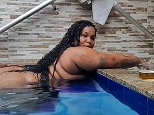 Naughty BBW enjoys pool time and gets the body wet in more than one way