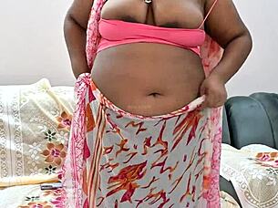 Look at this Indian bhabhi's natural tits on webcam!