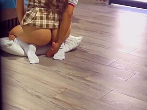 pervert surprises curvy girl in school uniform. she pleasures herself to a big spill on the floor