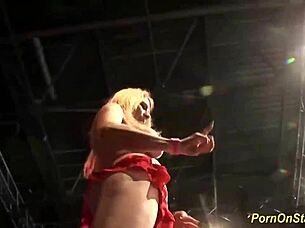 Cock sharing show on public stage