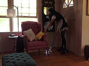 French maid vacuums house in stockings showing upskirt