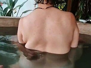 A blonde wife comforts her husband's friend with sensual touches and more