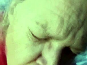 Hot milf subtly sucking on a big cock