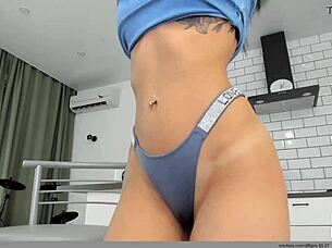 Cute Girl Performs Striptease