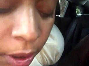 ebony woman gives public oral in car