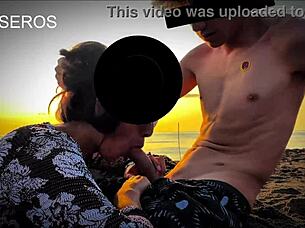 Stranger gives blowjob on public beach