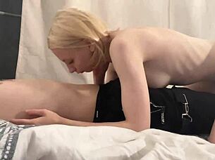 In the dorm, a 19-year-old blonde girl helps her roommate with a personal issue.